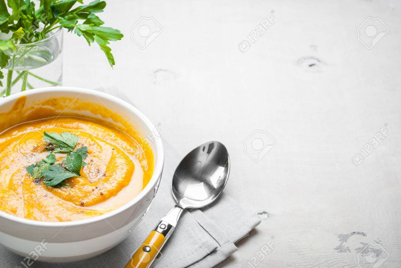 Pumpkin Soup With Parsley Background Space For Text Stock