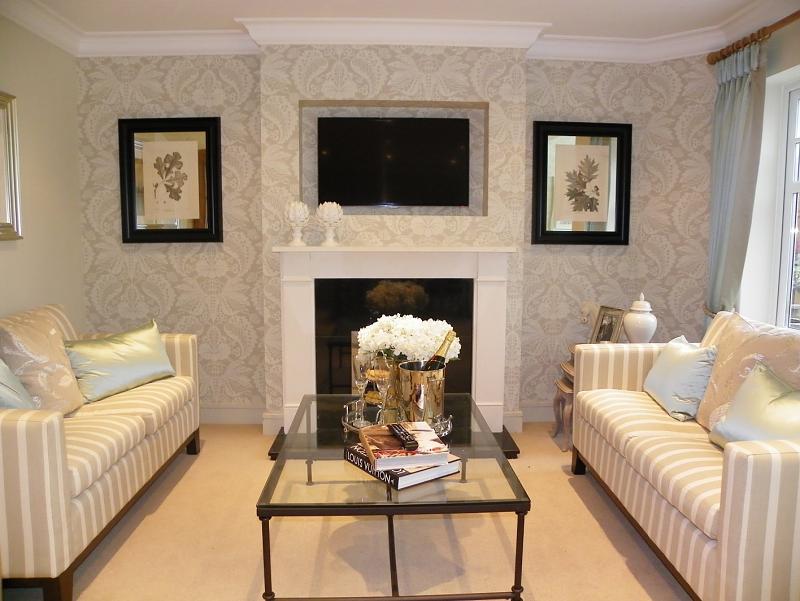  beige living room lounge with feature wall wallpaper and coffee table