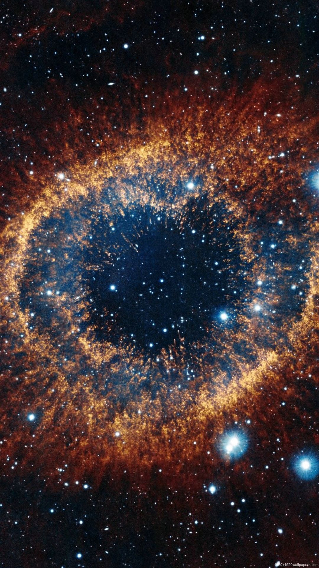 A breathtaking view of the Helix Nebula, showcasing its vibrant orange and blue hues. This stunning image captures the intricate details of the dying star's gaseous remnants. Perfect for universe enthusiasts