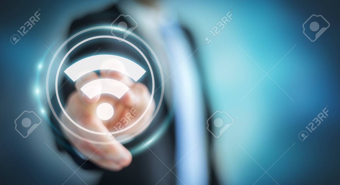 Businessman On Blurred Background Using Wifi Hotspot