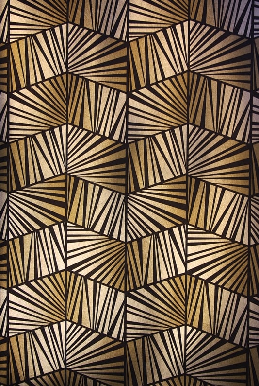  Art Deco style wallpaper with a geometric pattern in old gold