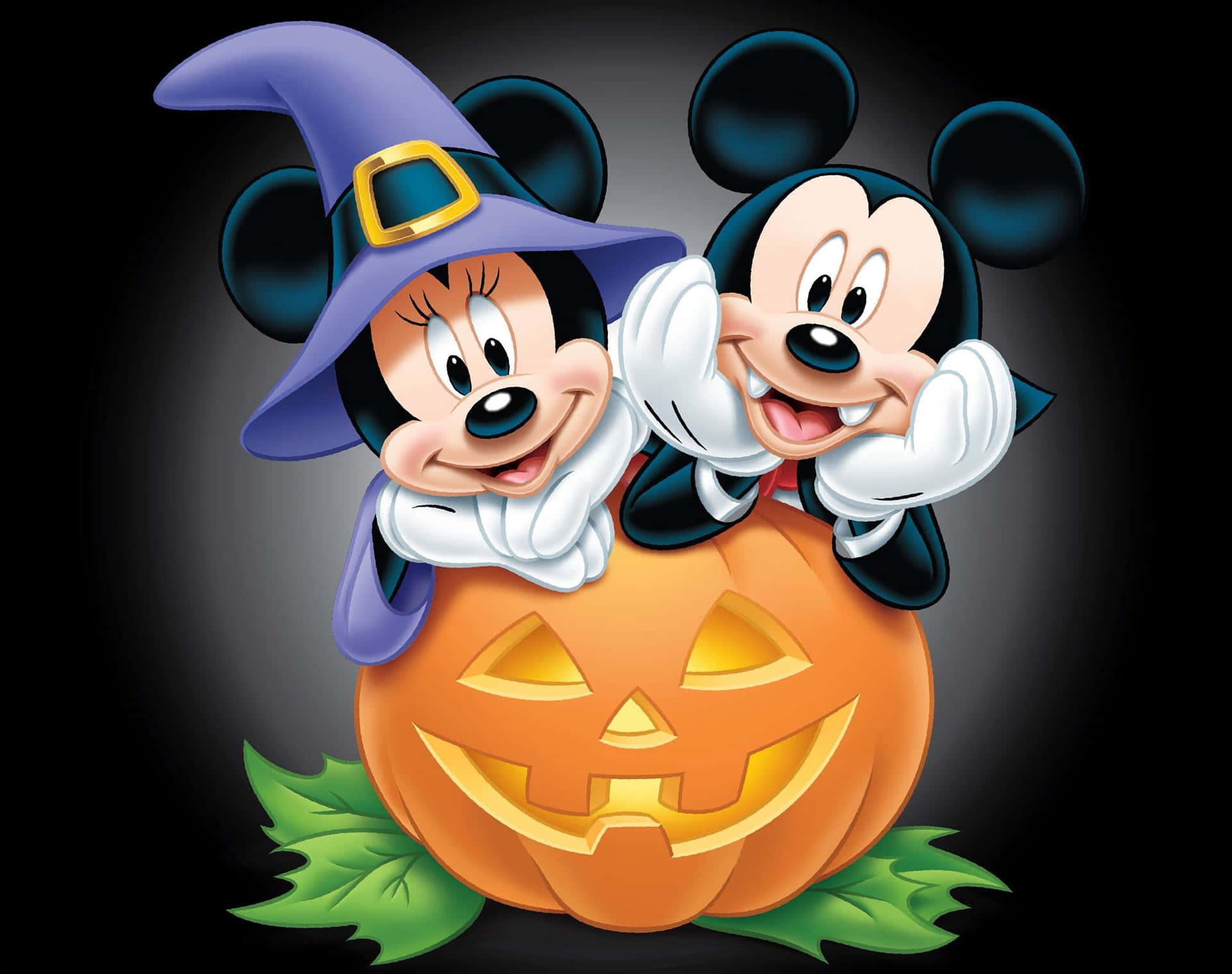 Mickey and Minnie Mouse celebrate Halloween with a carved pumpkin