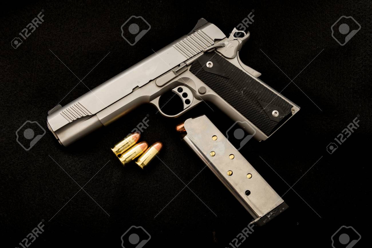 A With Clip And Ammunition On An Isolated Background Stock