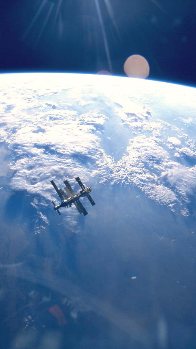 The Iss In Orbit Wallpaper For iPhone