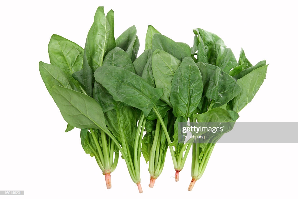 Bunch Of Spinach Leaves On A White Background Stock Photo Getty