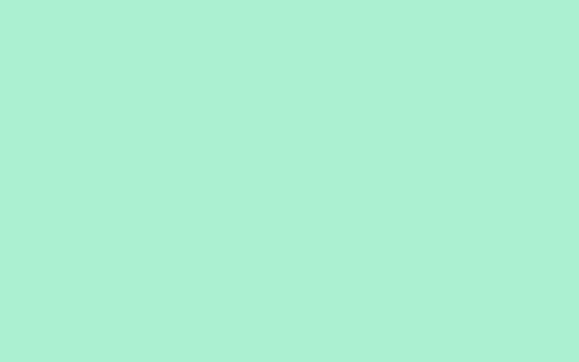 A solid background of mint green, evoking a sense of freshness and tranquility