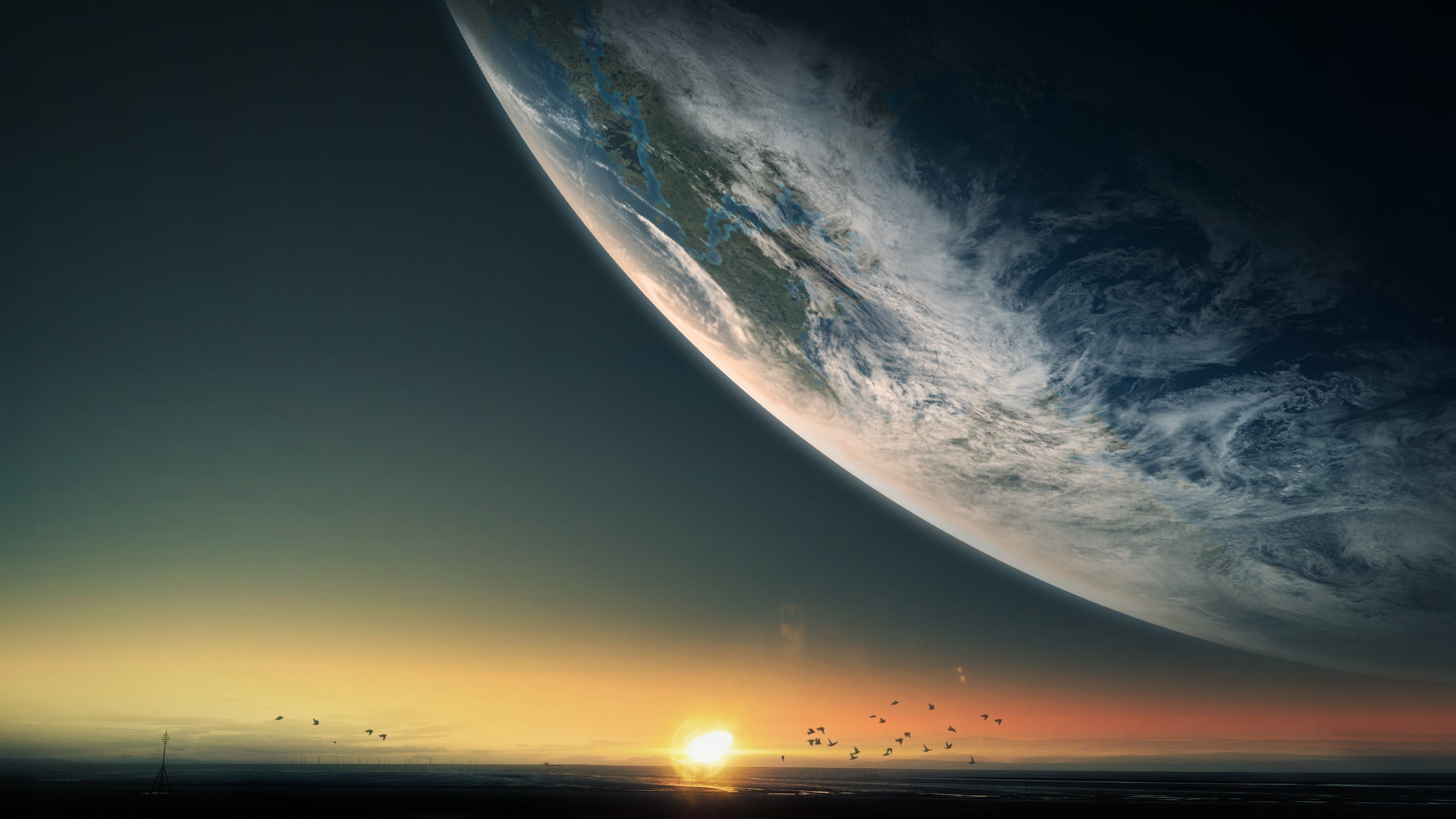 A breathtaking view of a large, Earth-like planet curving over a tranquil sunset, with birds silhouetted against the vibrant sky
