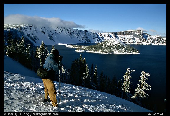 Photographer On Rim Of Lake In Winter Crater National Park