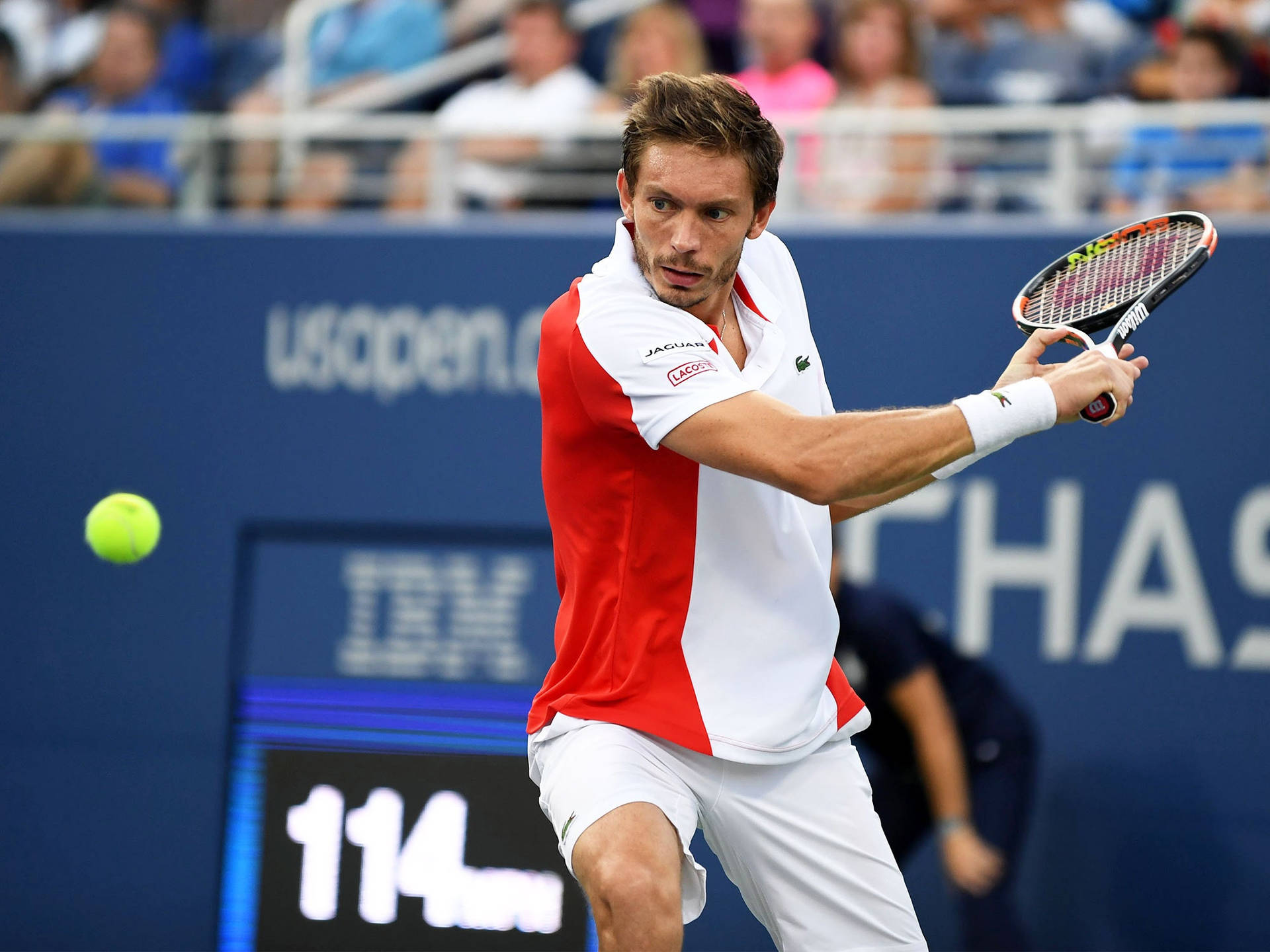 Professional Tennis Player Nicolas Mahut Intensely Focusing On Wallpaper