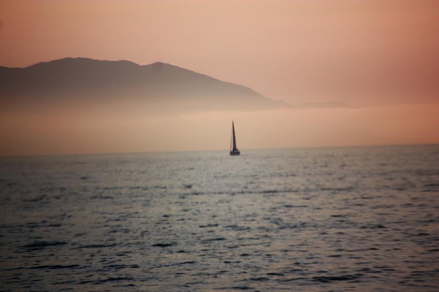 Dusky Pink Sunset With Sailboat And Mountain Background Photograph