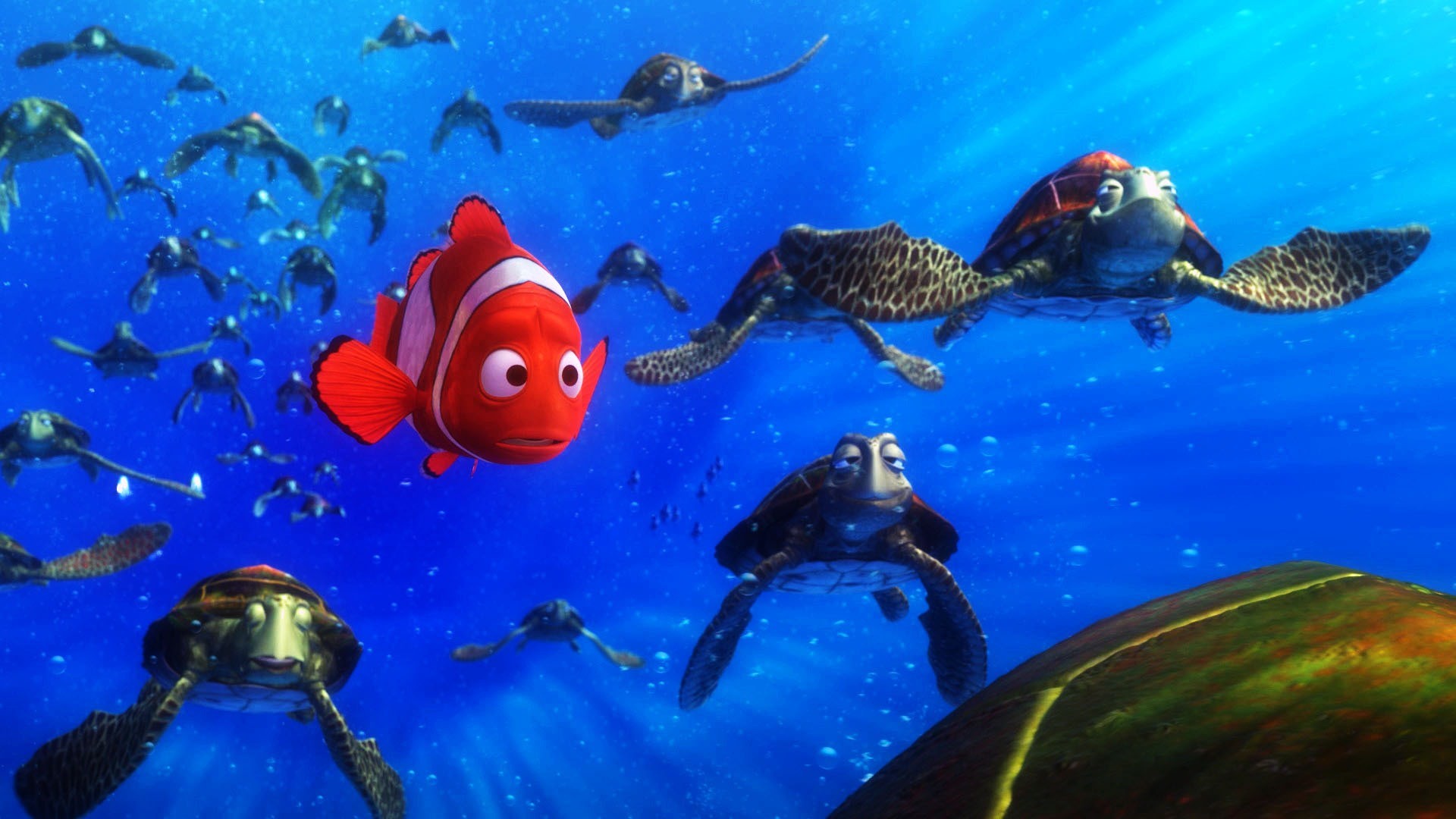 Marlin and Crush from Finding Nemo swimming with a group of sea turtles
