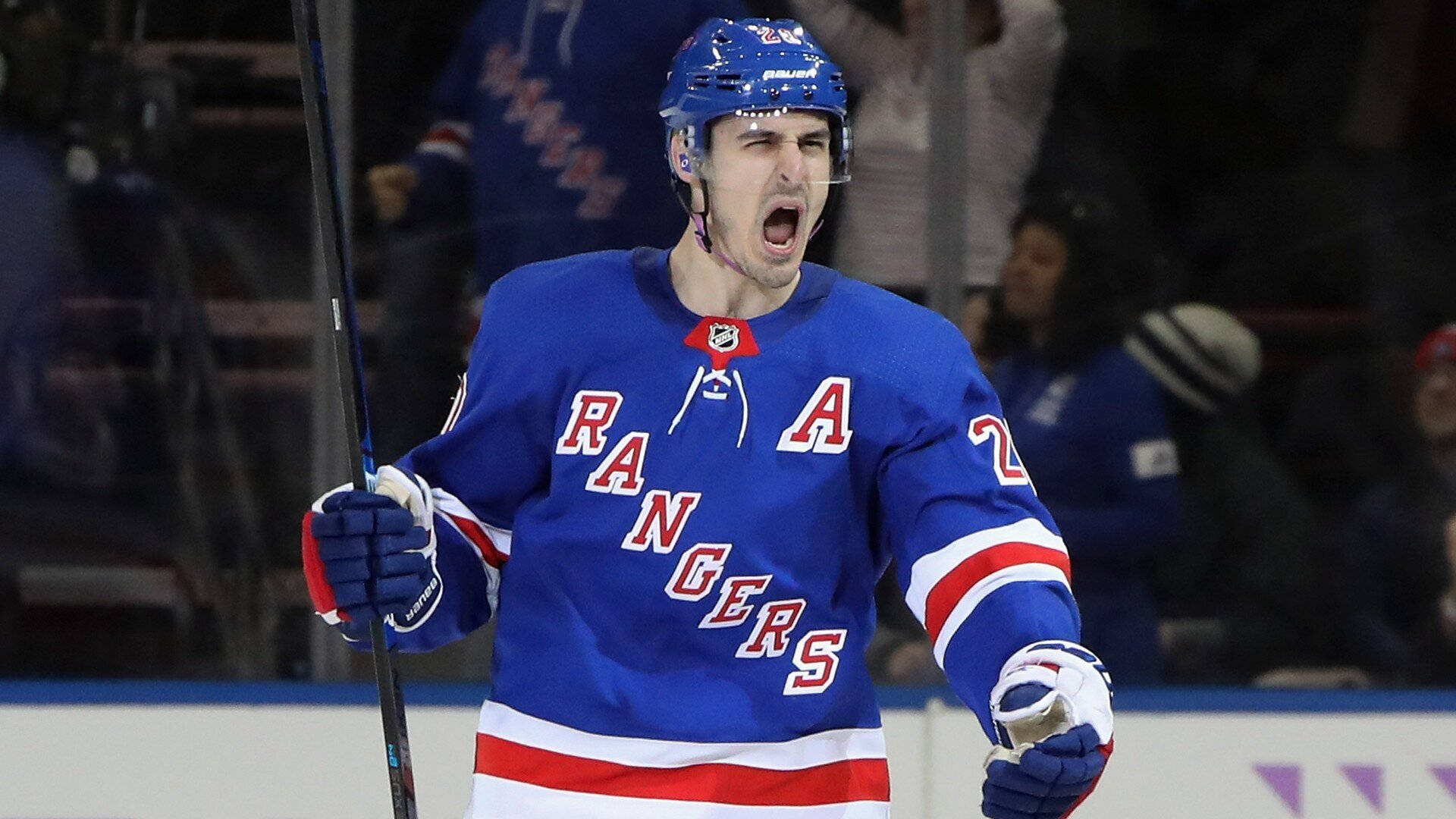 New York Rangers player celebrates a goal or victory on the ice