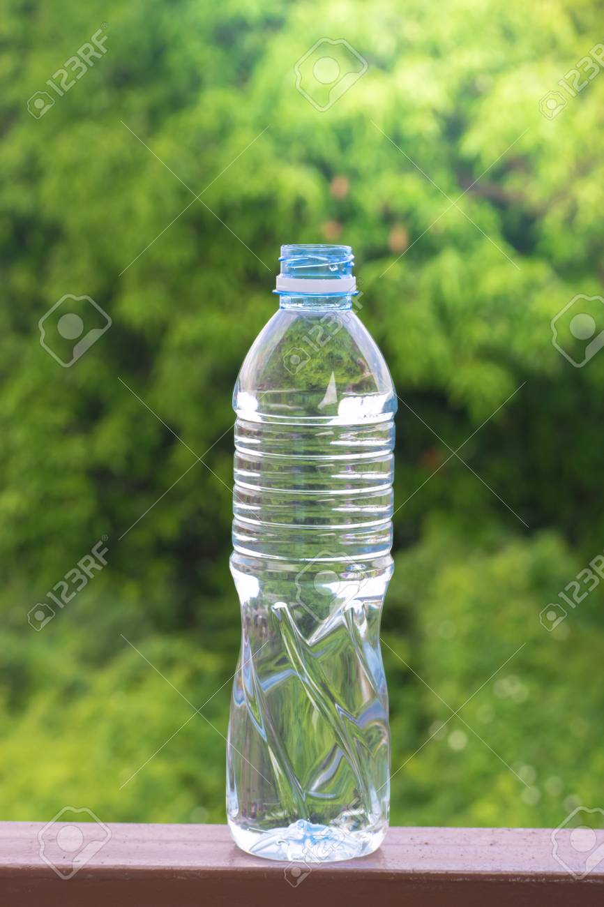 Bottle Water Made To Plastic On Tree And Leaf Background Using
