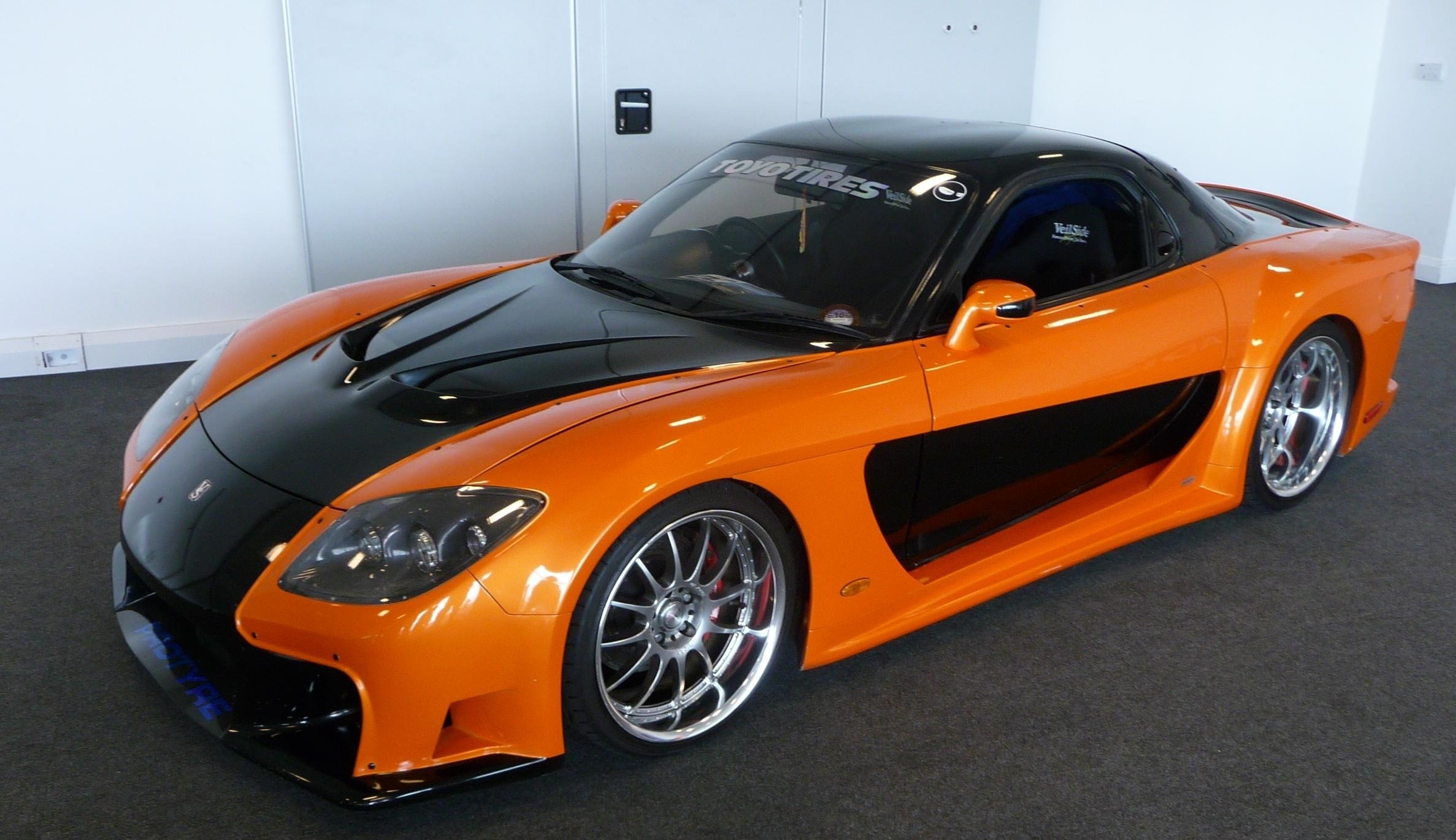 Tuned Orange Mazda RX-7 VeilSide Fortune, reminiscent of  Fast and Furious cars