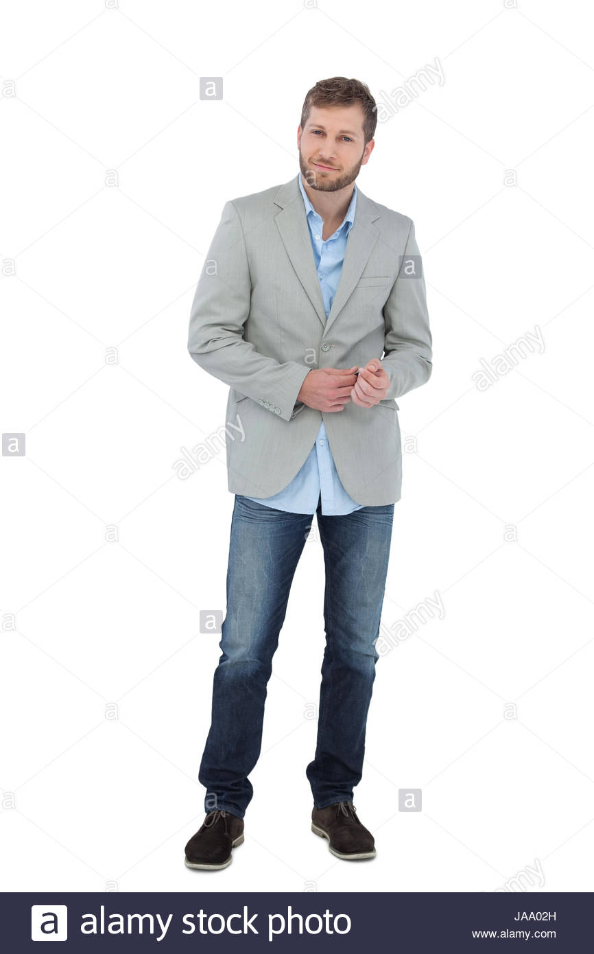 Suave Man In A Blazer Posing On White Background Stock Photo