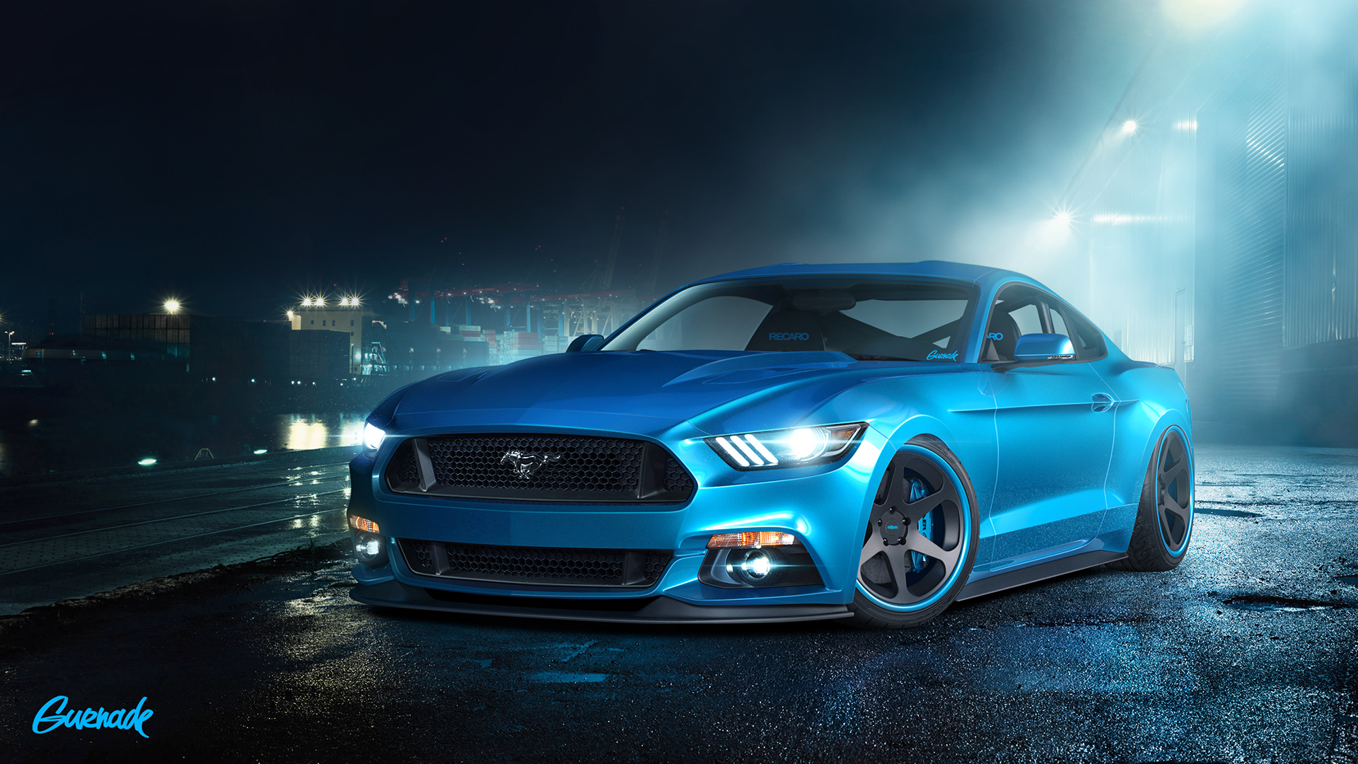 A vibrant blue Ford Mustang, modified with custom rims and lowered suspension, parked on a wet asphalt surface at night, with city lights in the background