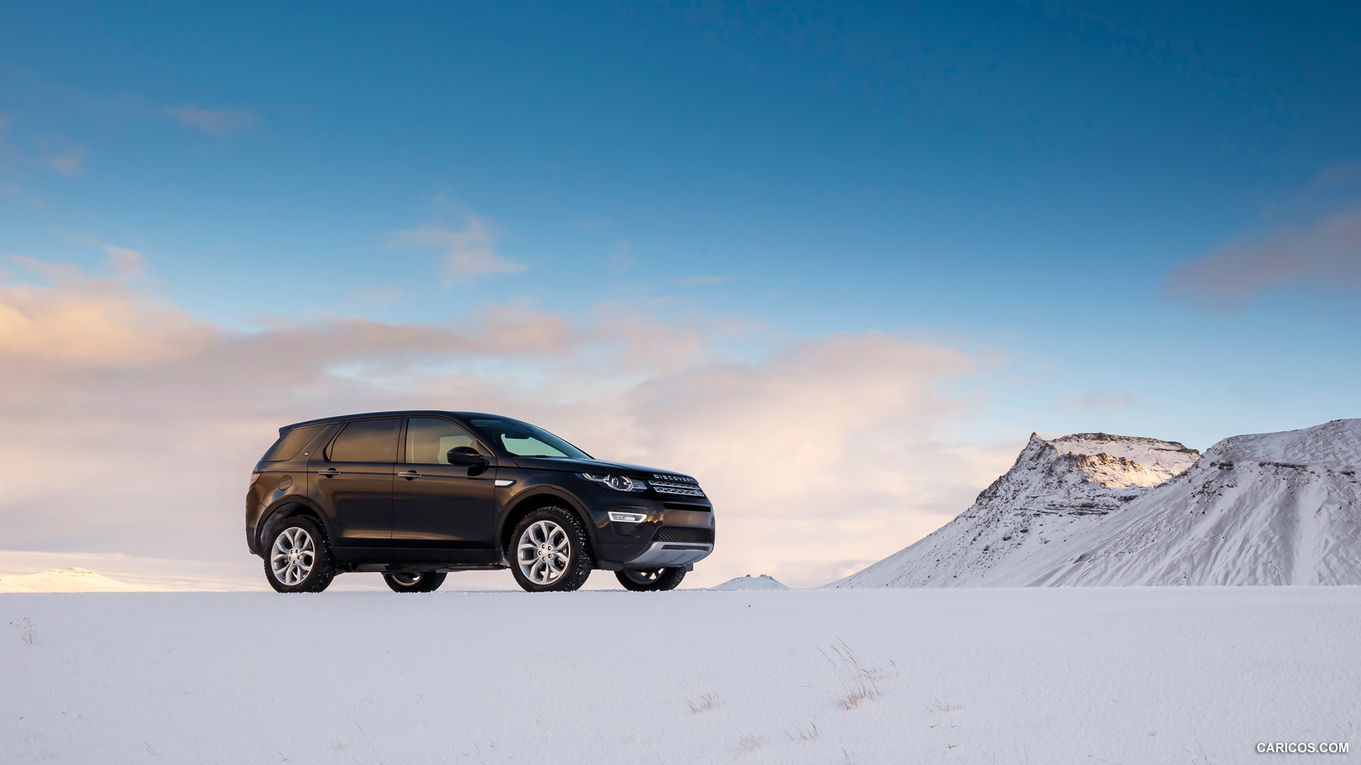 Land Rover Discovery Sport Barolo Black In Snow Side