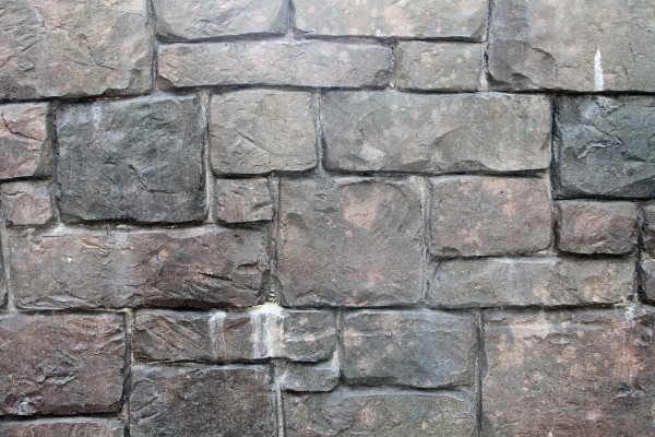 Four images of a stone castle wall texture for graphics and texture