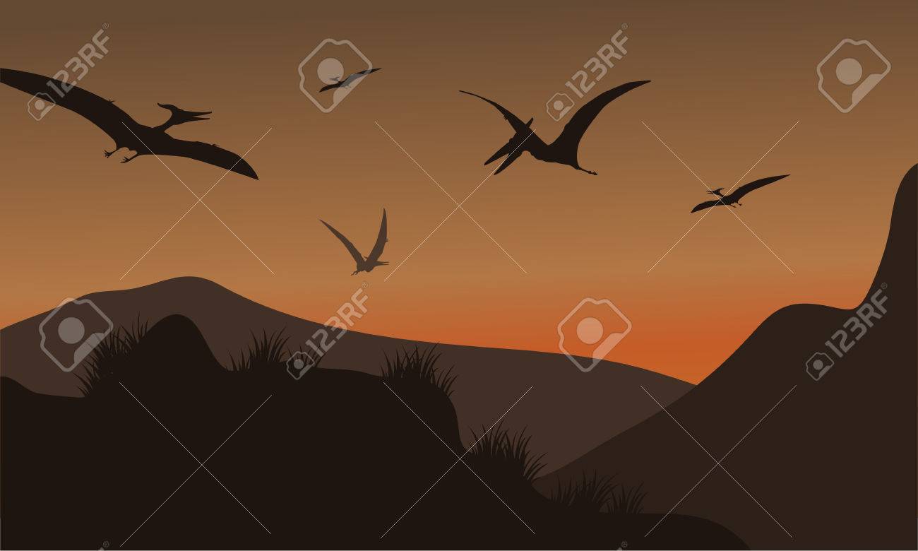 Silhouette Of Pterodactyl Flying At Afternoon With Brown