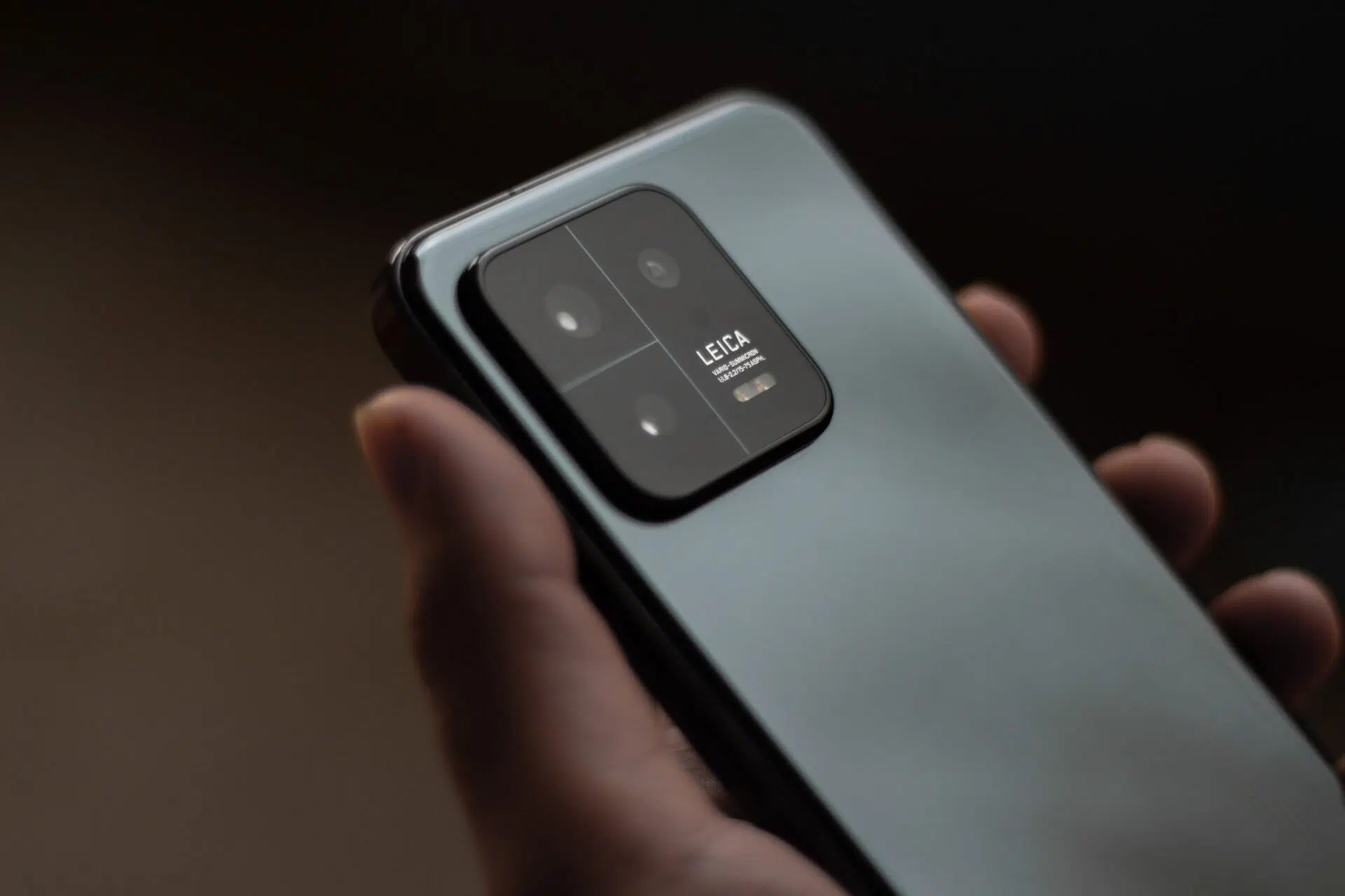 Close-up of the Xiaomi 14 Pro's camera module, showcasing the Leica branding and lens arrangement