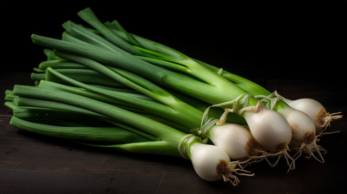 Green Onion Isolated On A Black Background Wallpaper