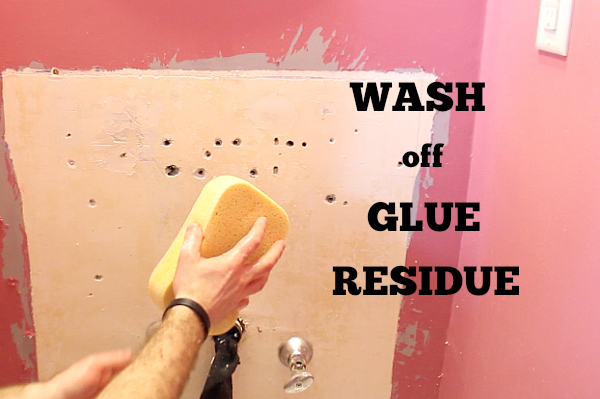 with a grout sponge to clean off this old residue