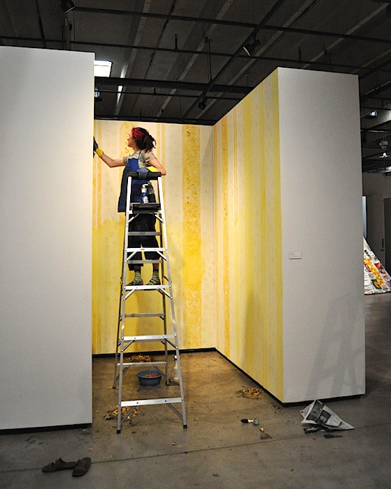 Kerrane Washing Off The Installation Yellow Wallpaper At Redline