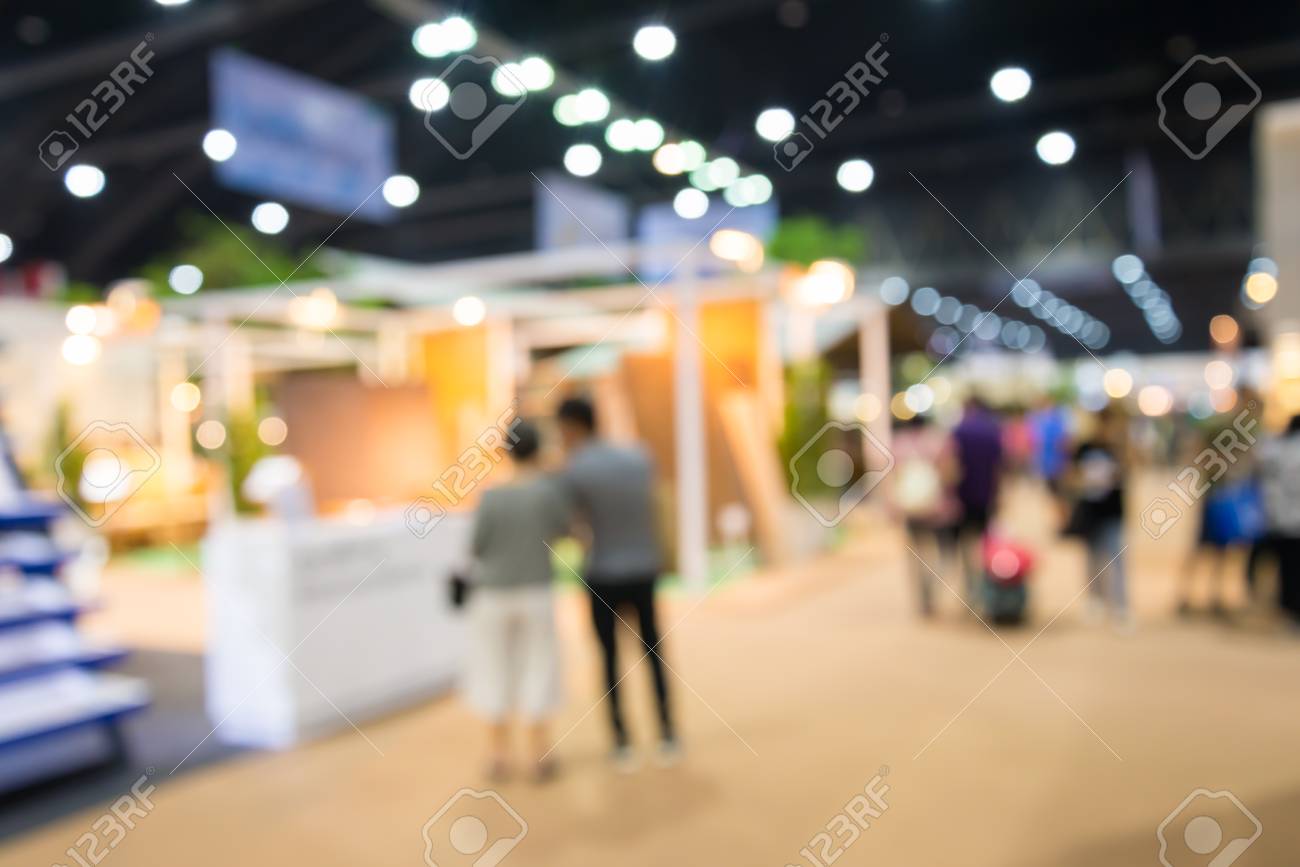 Abstract Blur People In Home Expo Event Background Stock Photo