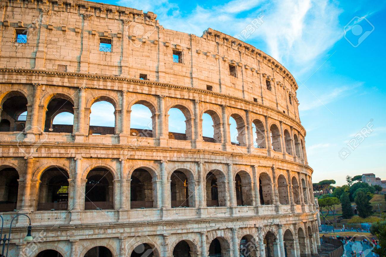 Colosseum Background Blue Sky In Rome Italy Stock Photo Picture