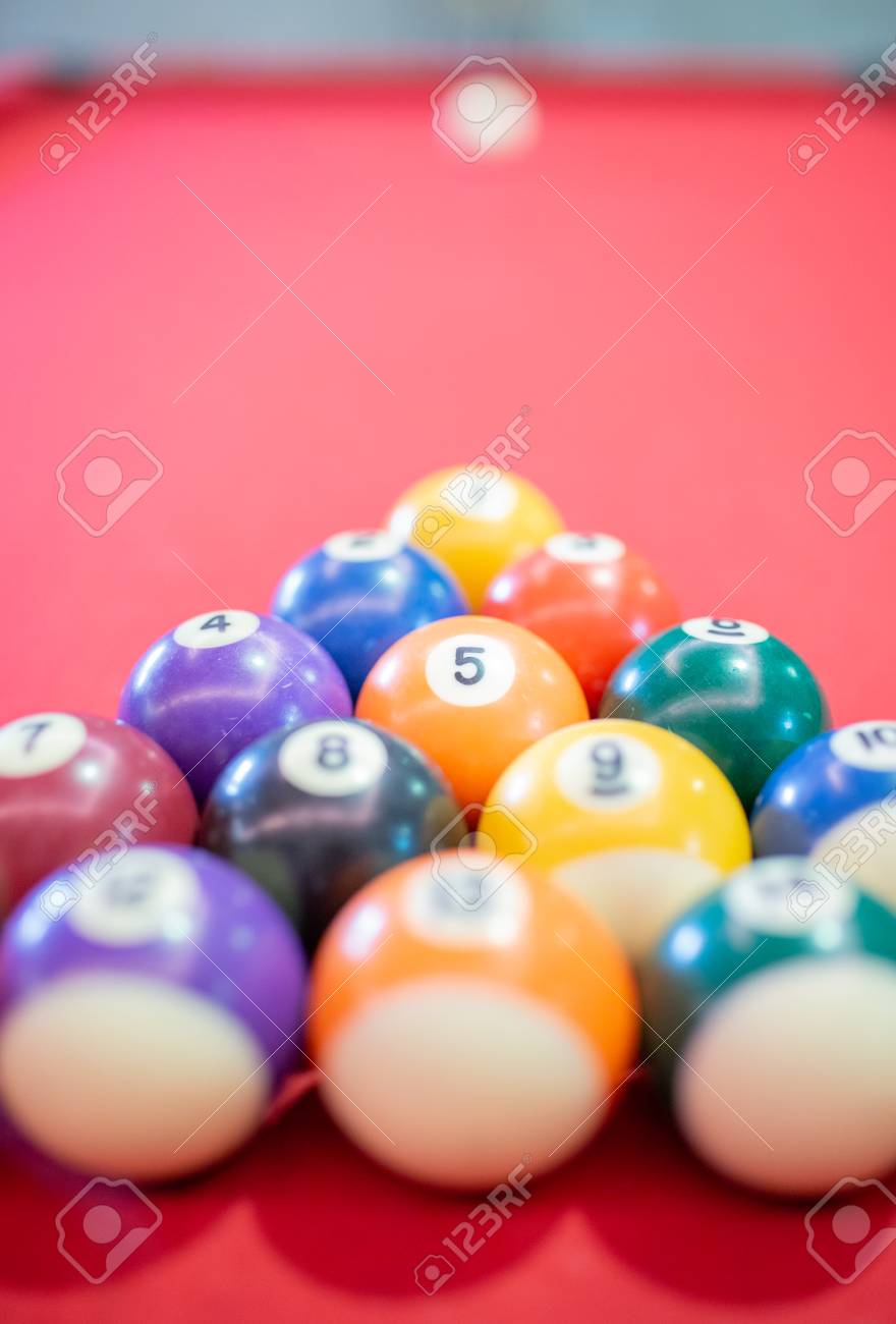 Billiard Ball On Red Table Background In Pub Bar Room Concept