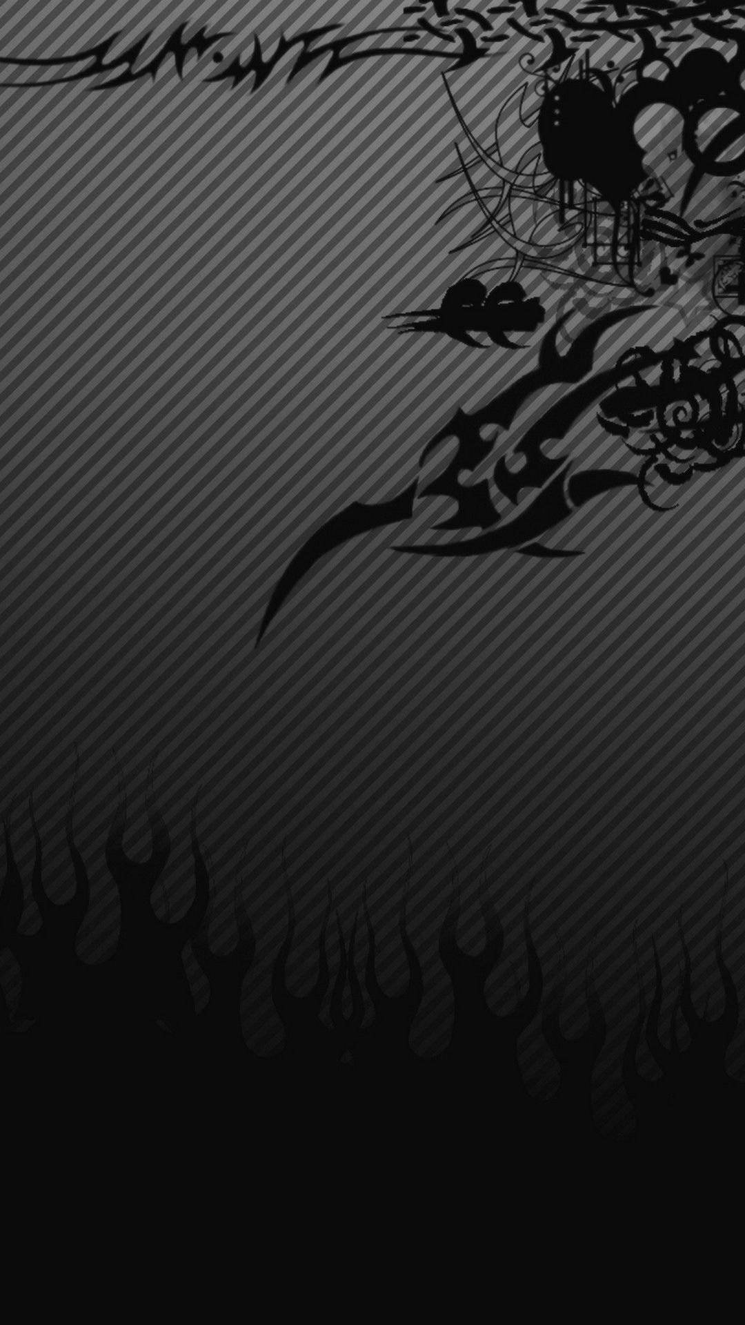 A dark and edgy abstract design with tribal tattoo-inspired elements and flames, ideal for a tattoo-themed wallpaper