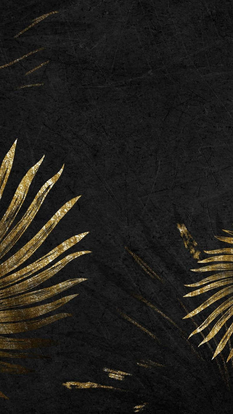 Dare To Stand Out From The Crowd With A Black And Gold Wallpaper