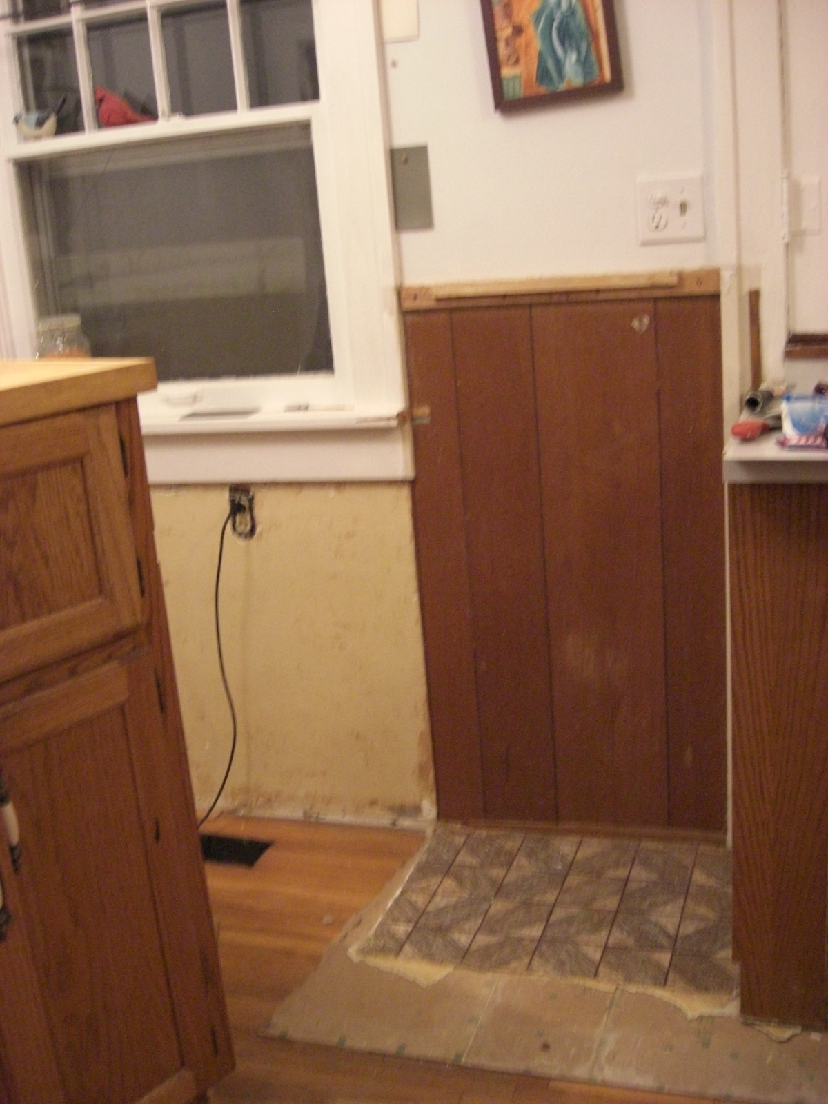  fact that there was once wood paneling in the kitchen  pre fake