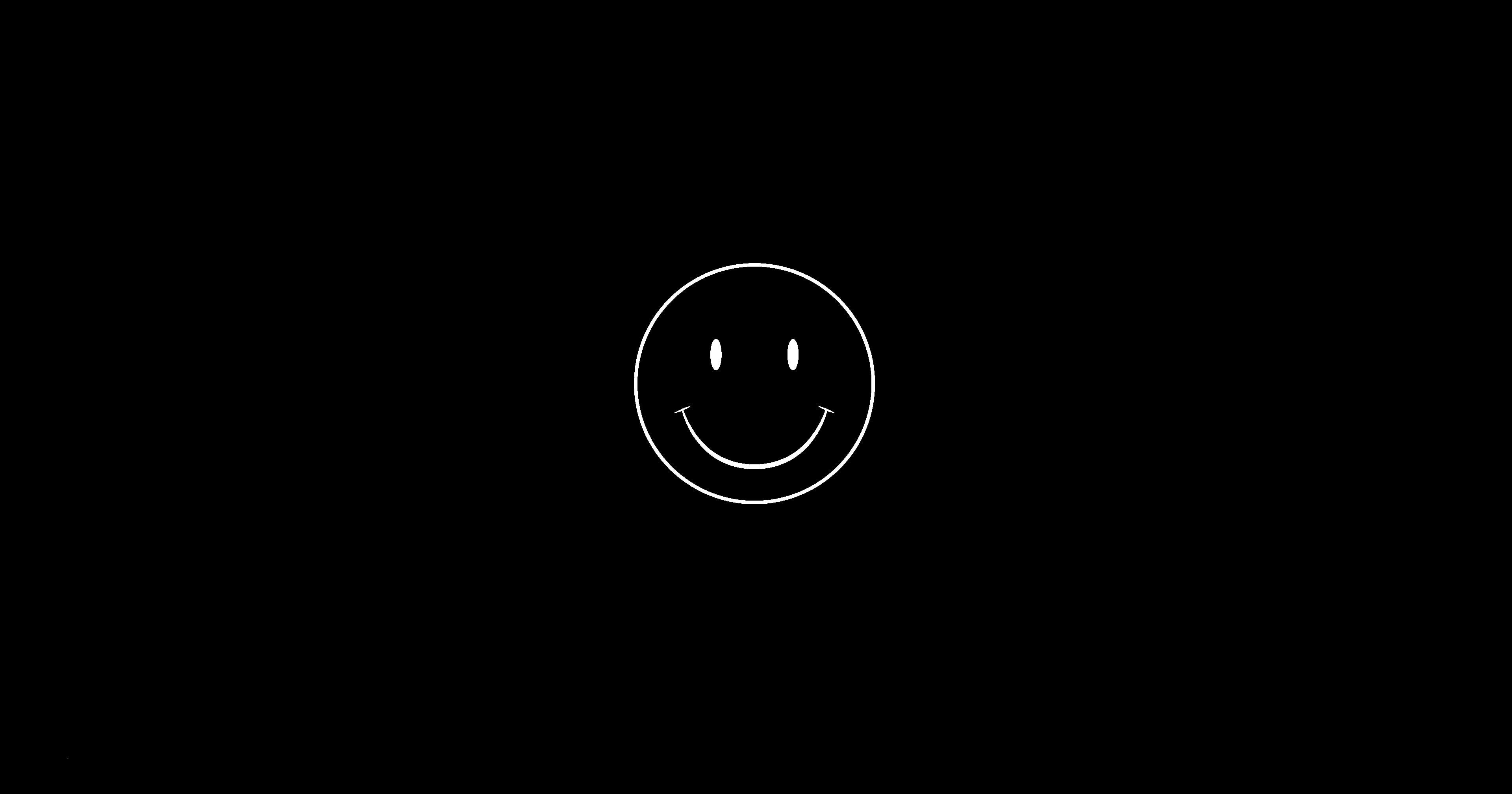Classic white smiley face on a black background
