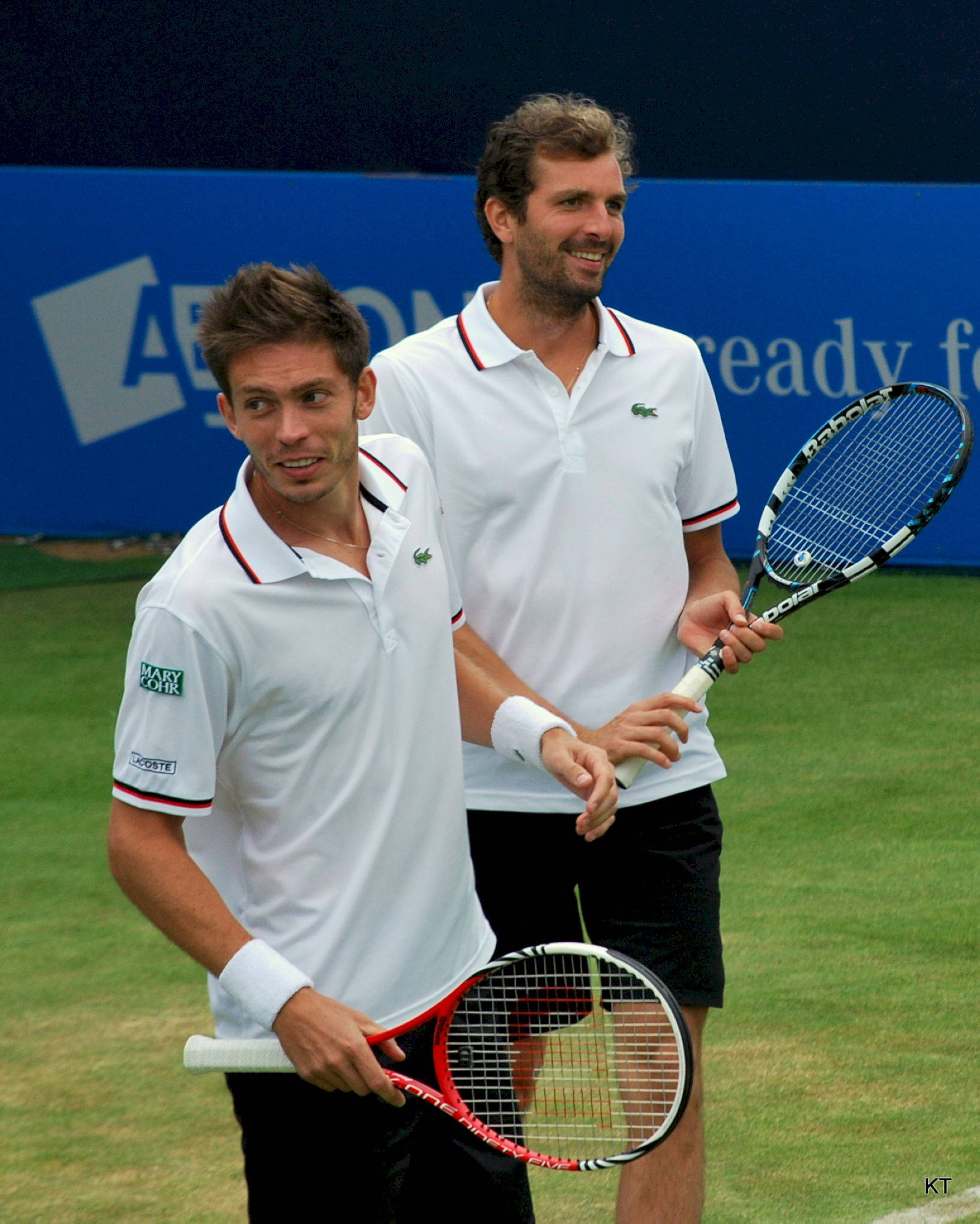 Nicolas Mahut Holding Up Trophy Wallpaper