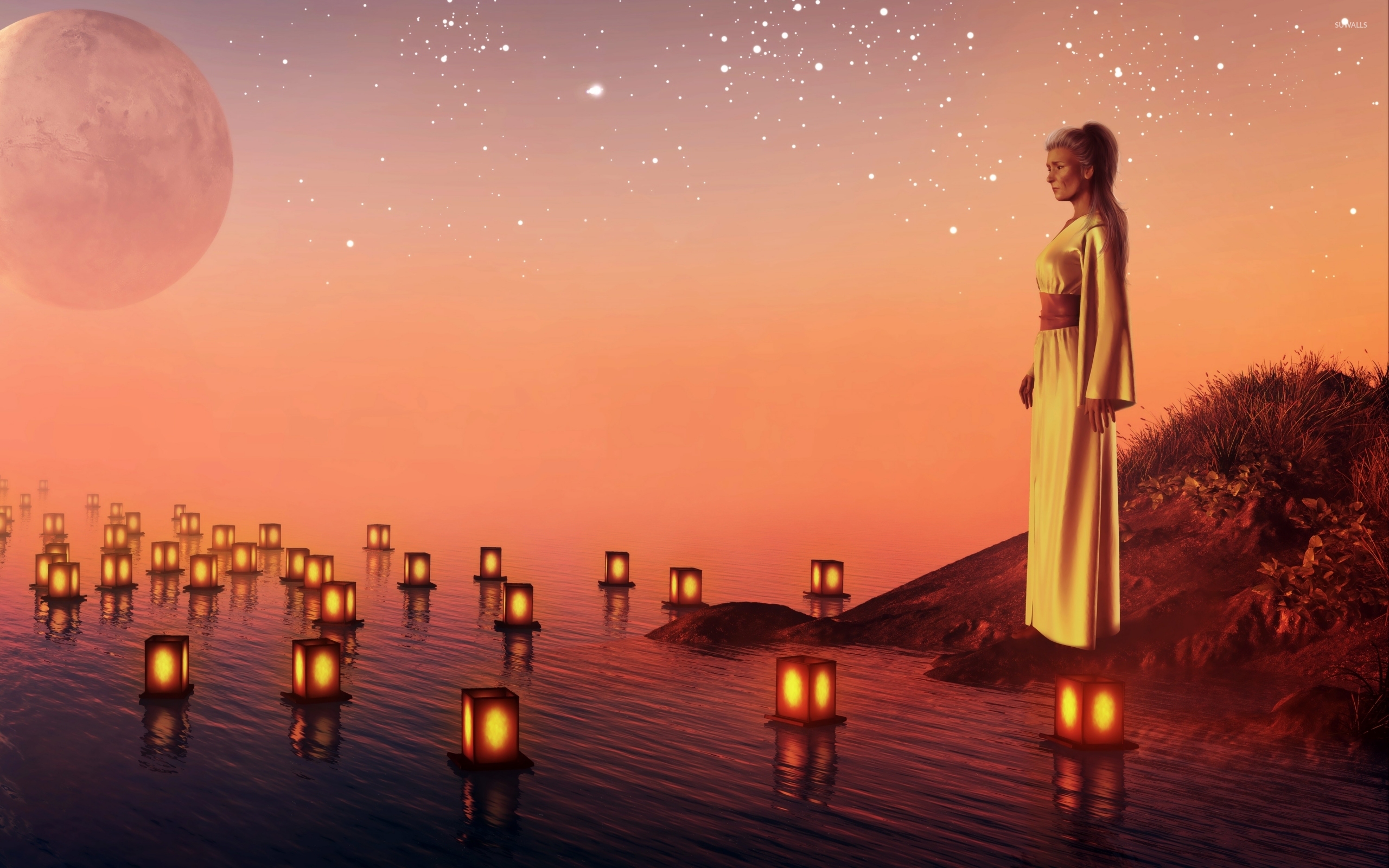 Sad Woman Watching The Candles Floating On Water Wallpaper