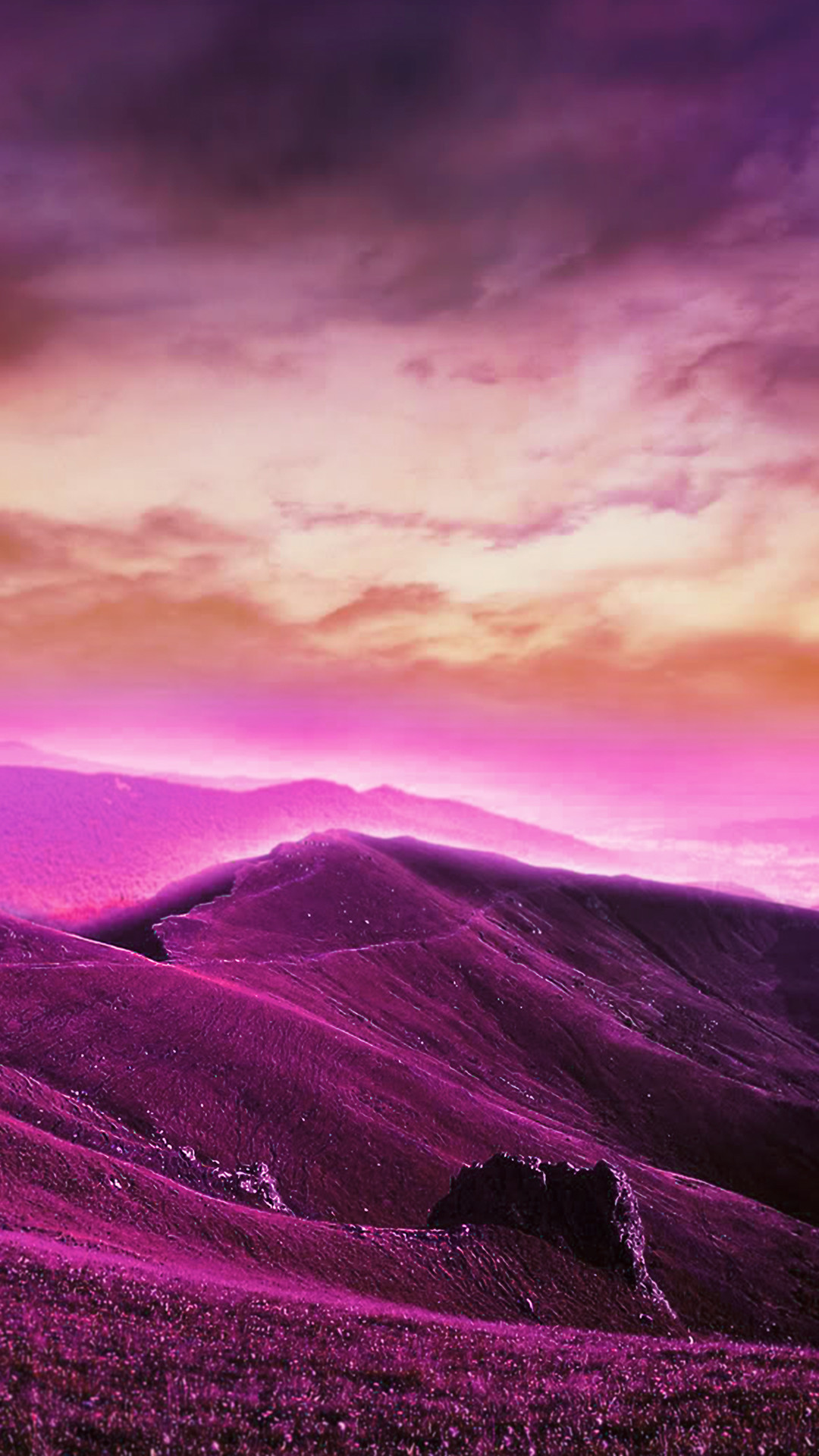 Vivid purple mountains at sunset, perfect for a phone wallpaper