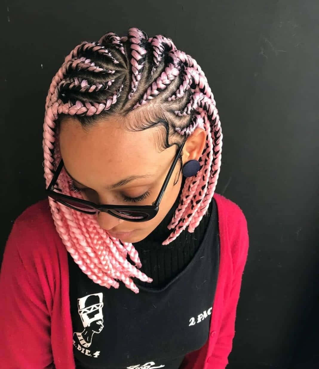 A Woman With Pink Braids In Her Hair Wallpaper