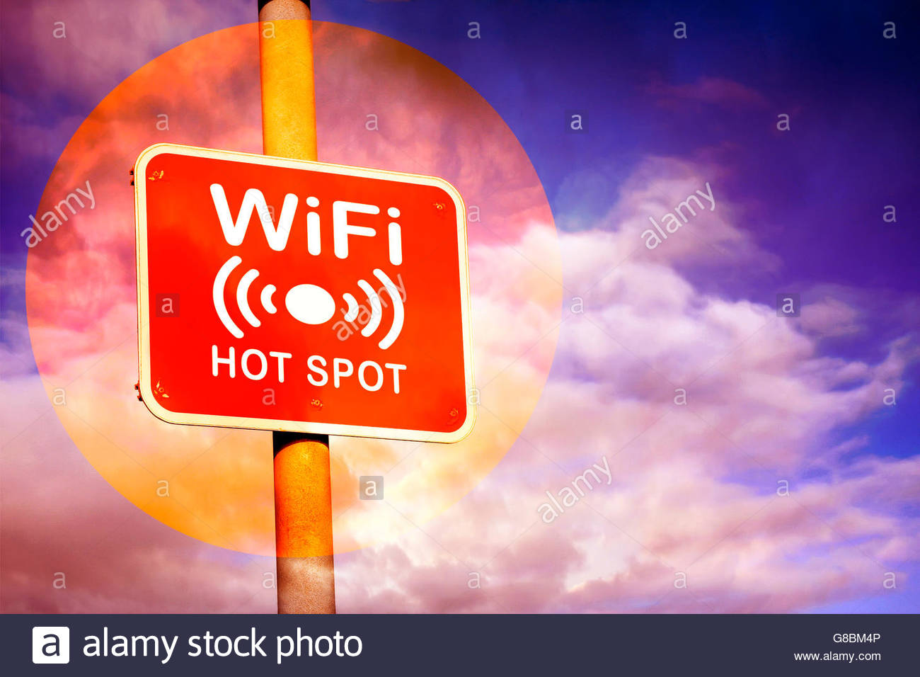 Red Wifi Hotspot Sign Against A Purple Sky Background Stock Photo