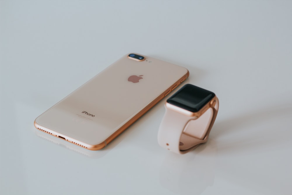 Gold iPhone Plus And Apple Watch Photo Image
