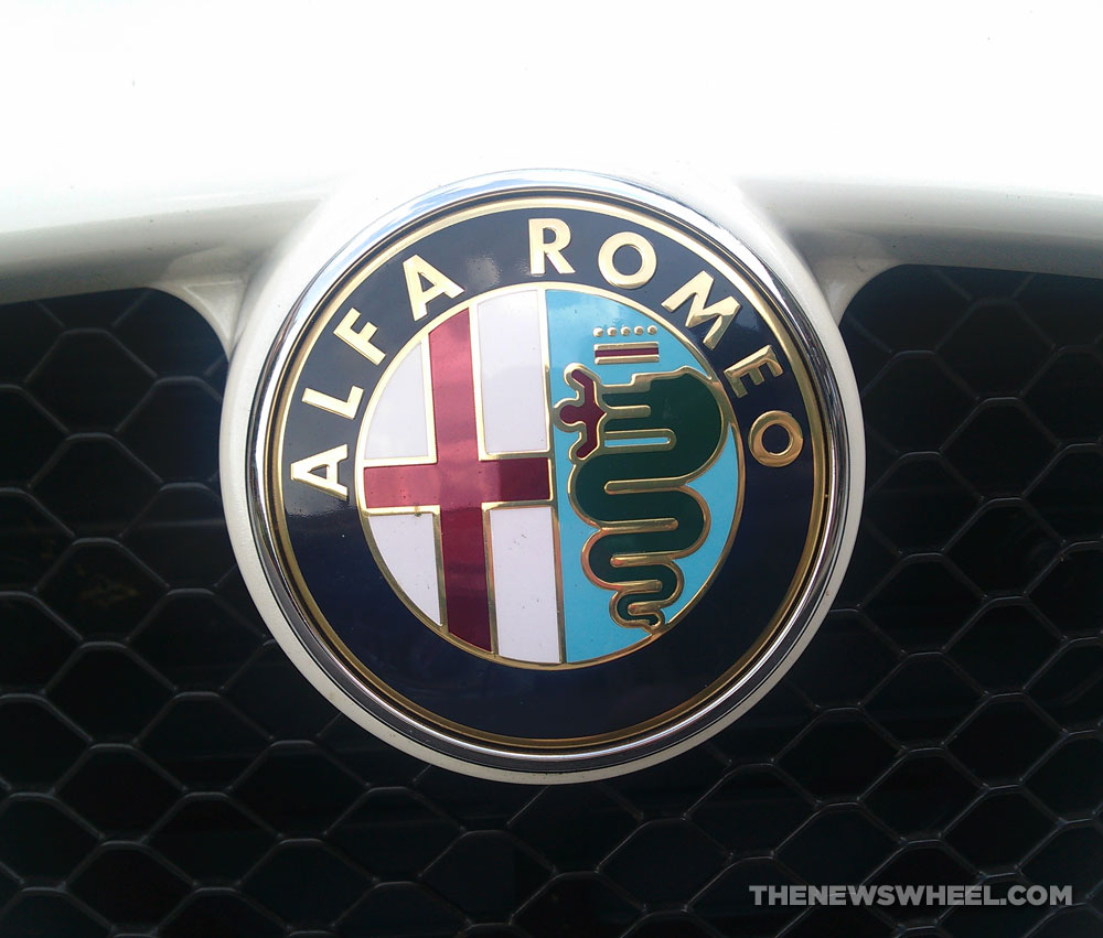Behind The Badge Why Alfa Romeo S Logo Features A Snake Eating