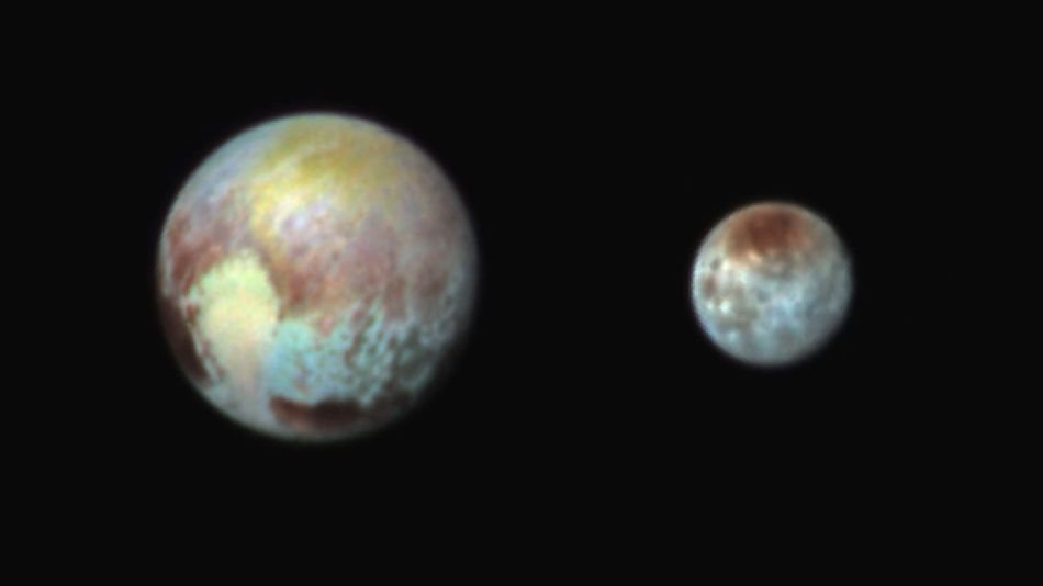Pluto Left And Its Largest Moon Charon Right In False Color Seen