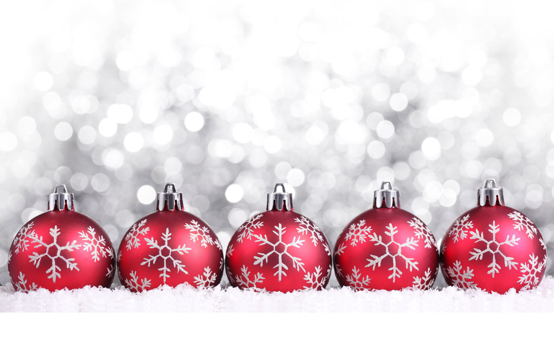 Red Christmas balls on Christmas silver background