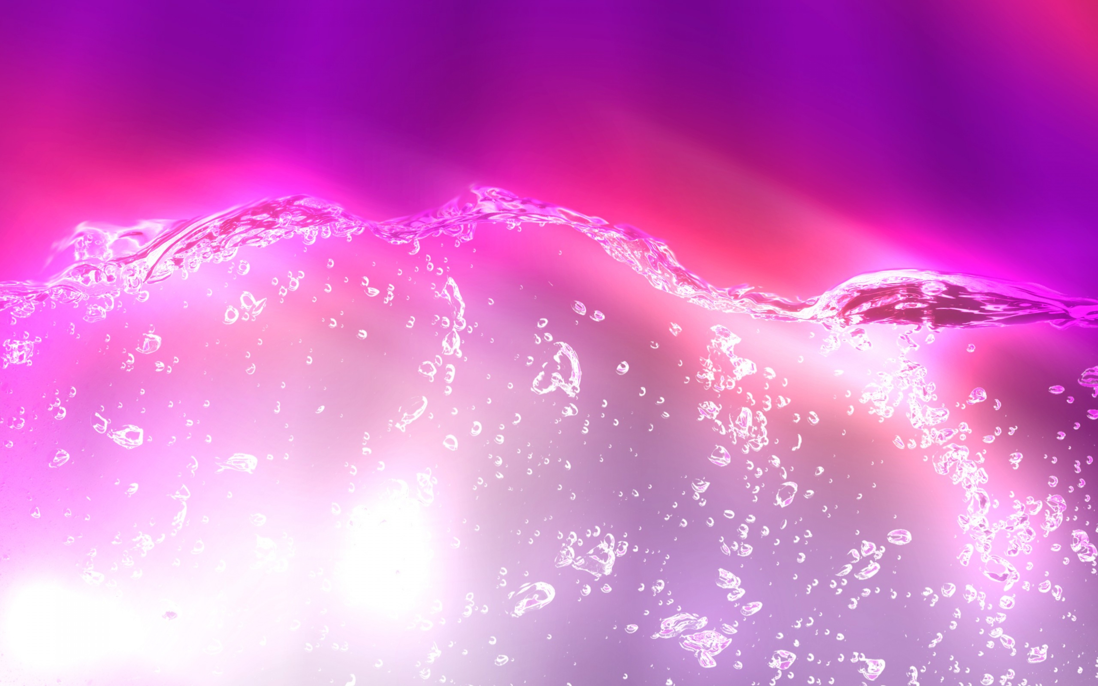 Abstract image of shimmering pink water with bubbles, evoking a glittery, glamorous feel