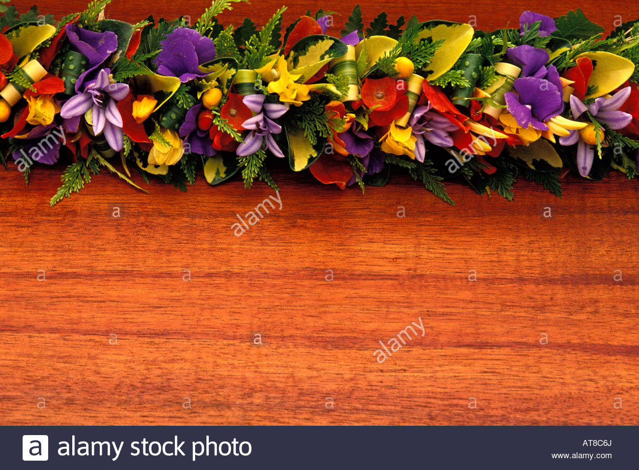 A Beautiful Purple Yellow And Red Haku Lei Hawaiian Floral Stock