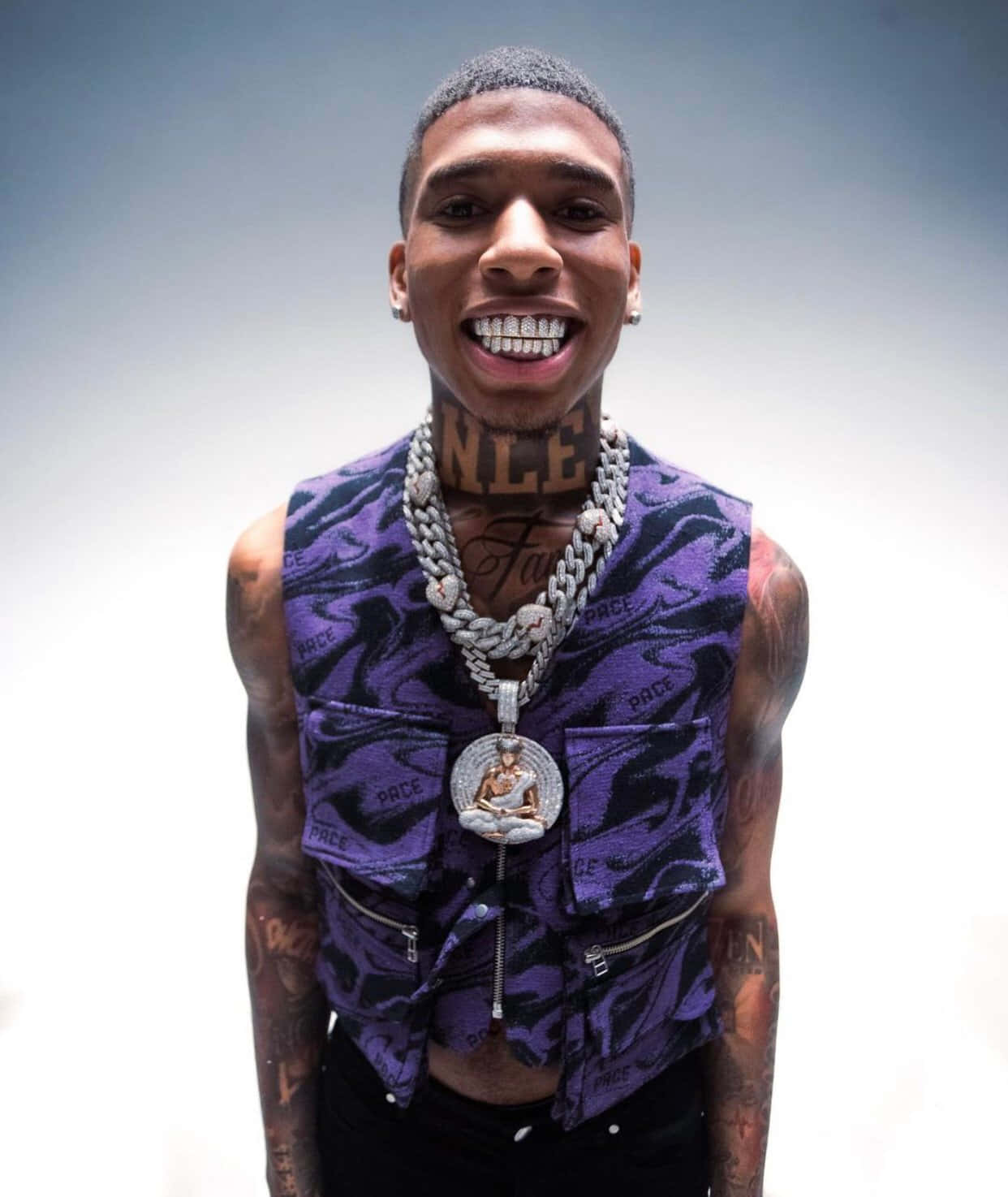 Nle Choppa Striking A Bold Pose Wallpaper