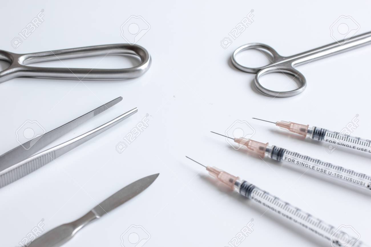 Instruments For Plastic Surgery On White Background Stock Photo