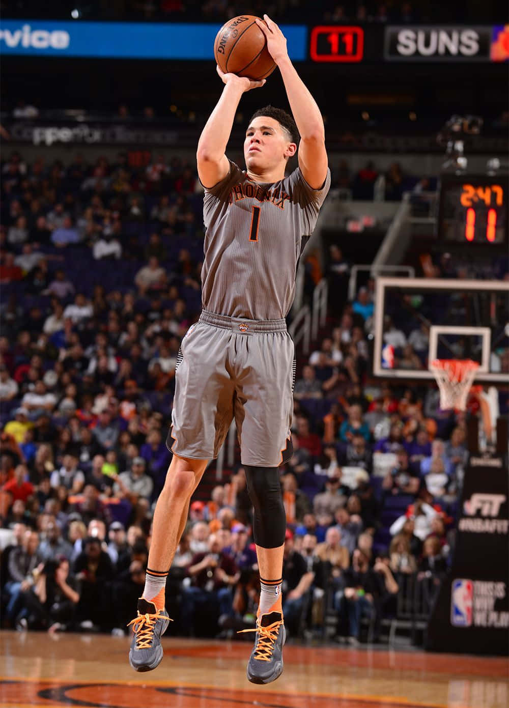 Devin Booker S Face On An iPhone Wallpaper