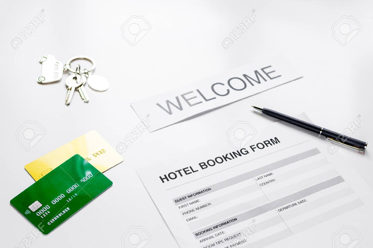 Reservation Form On Hotel Reception Desk Background Stock Photo