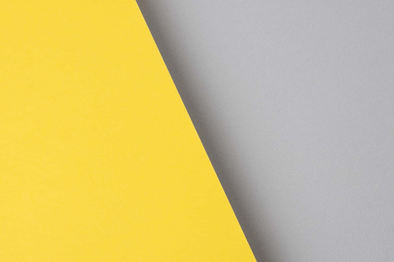 A Bright Gray And Yellow Wallpaper